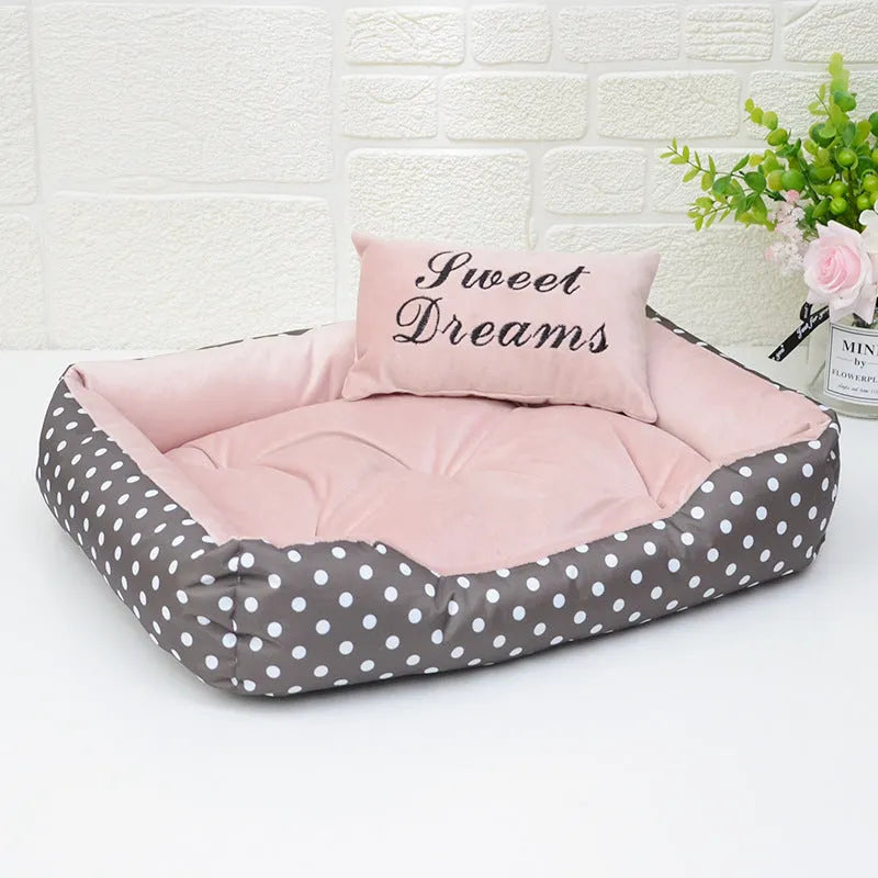 Polka dot print small dog bed with matching square pillow in grey, blue, pink or red.