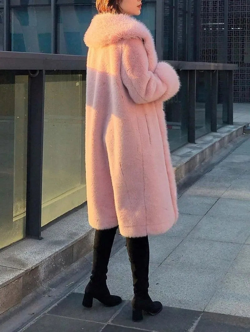Women's grey faux rabbit fur mid-length coat with a fur collar on a hanger.