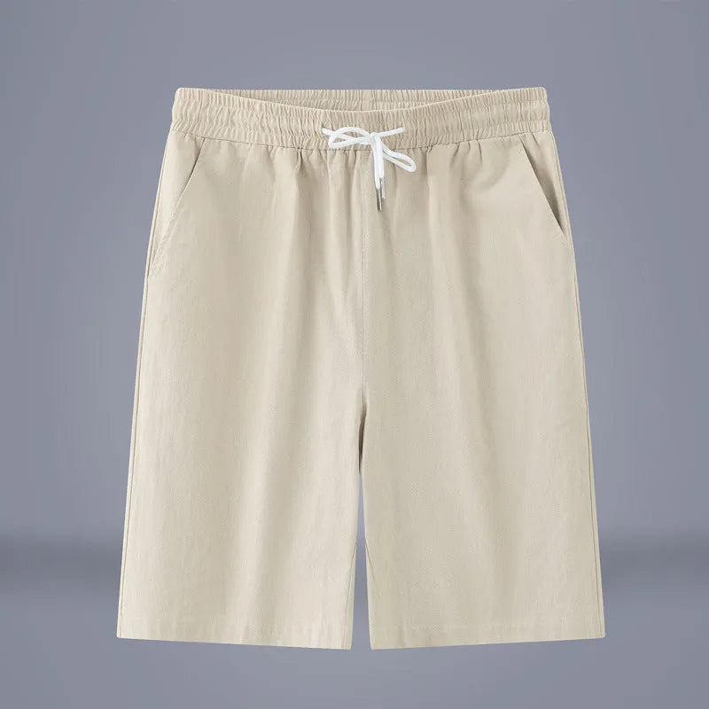 Solid colour cotton-linen cropped pants with a drawstring waist, shown in Army Green.