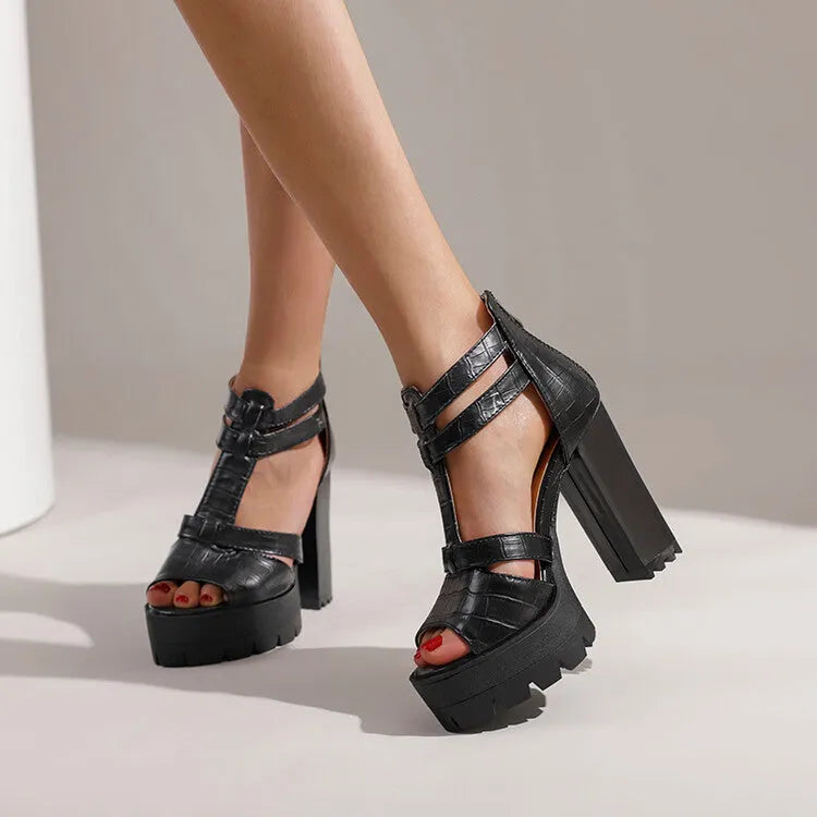 Platform high heel sandals in black with round toe, back zipper, and rubber sole