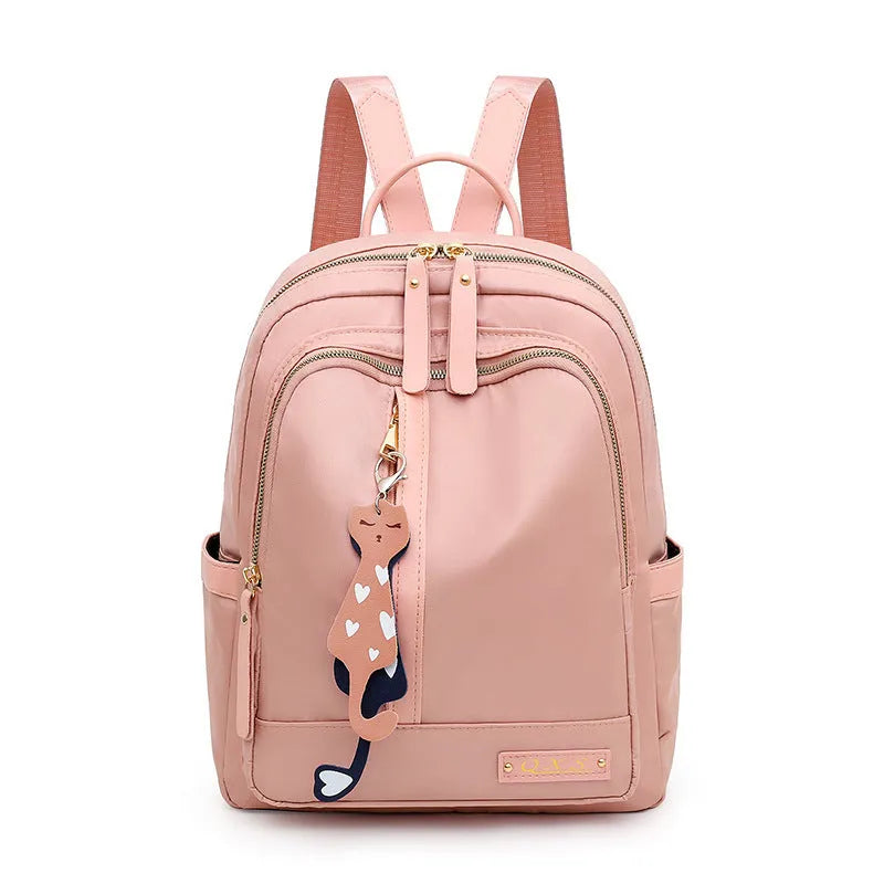 Black casual nylon backpack with shoulder straps showing internal organisation compartments