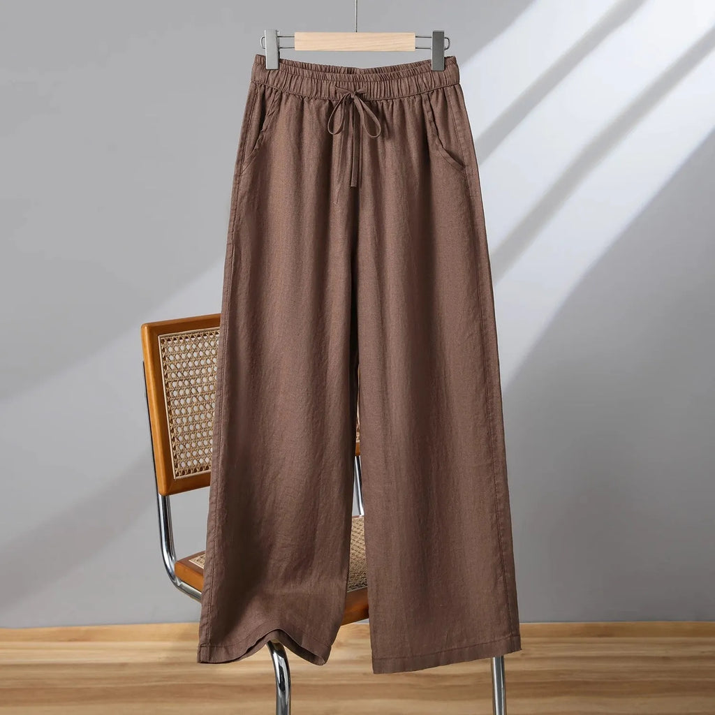 Women's straight-leg casual trousers with an elasticated drawstring waist in apricot colour