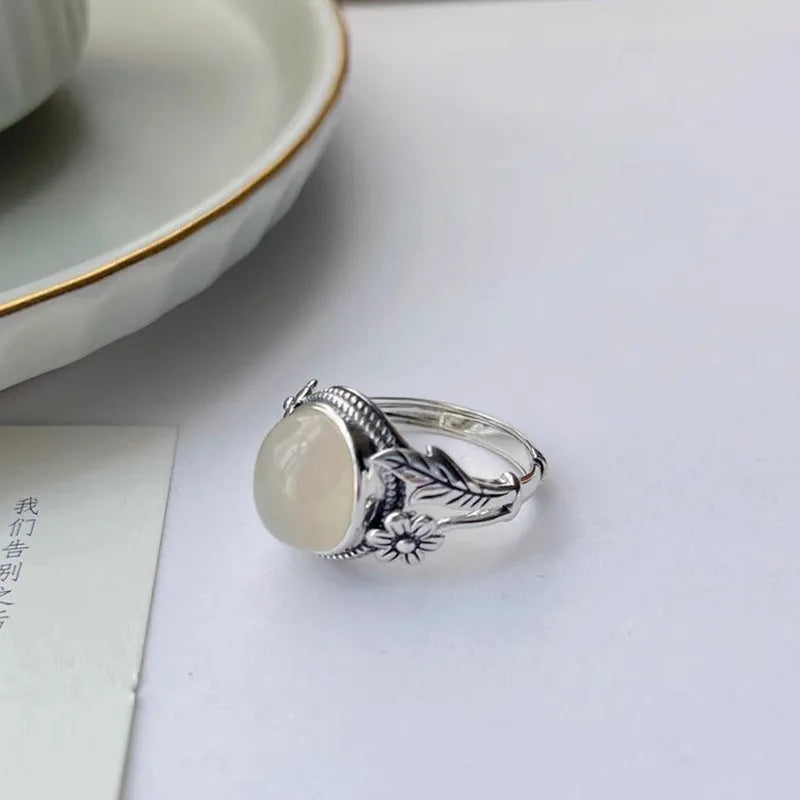 Adjustable vintage copper ring with white chalcedony design and antique finish