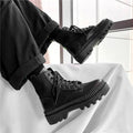 Men's black Dr Martens platform boots with a side zip on frosted cowhide leather.