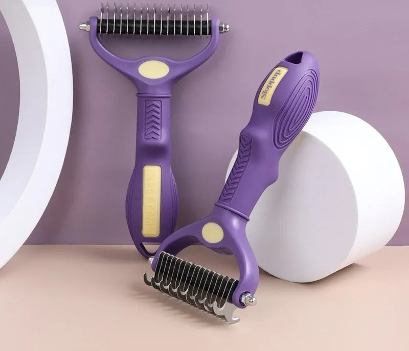 Purple double-sided plastic pet comb for detangling knots from cat or dog fur