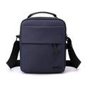 Men's waterproof crossbody bag in army green with PU leather exterior and sewing line detail