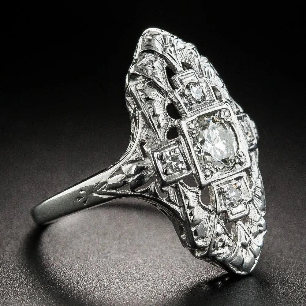 Geometric hollow-out copper ring with silver electroplated finish and diamond stud accents