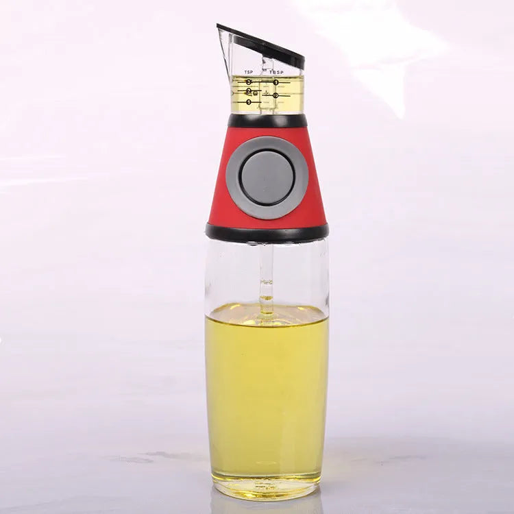 500ml high white glass measurable oil bottle with slim 8x28.5cm shape on kitchen countertop