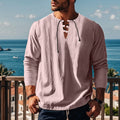 A loose, solid-colour cotton blend pullover shirt with a ruff collar, shown in a light blue shade.