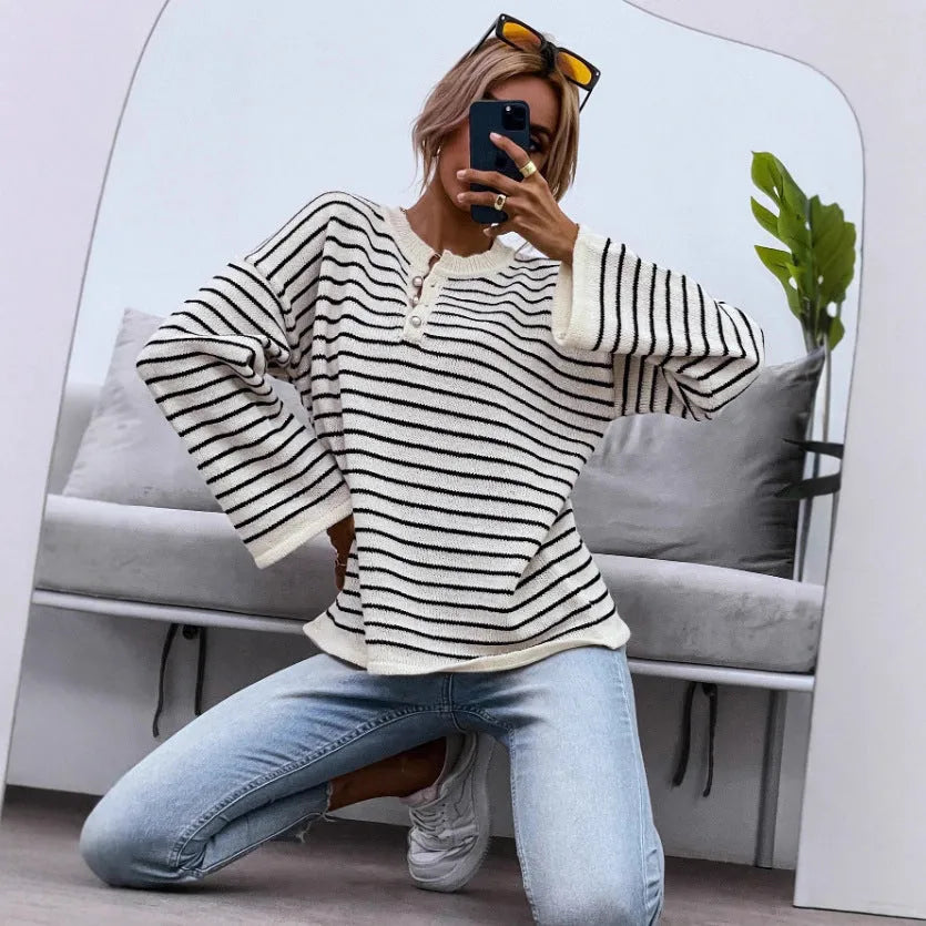 Black women's striped casual top with long sleeves and drop-shoulder design