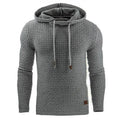 Men's black cotton polyester blend hooded sweater laid flat, showing the front design and hood.
