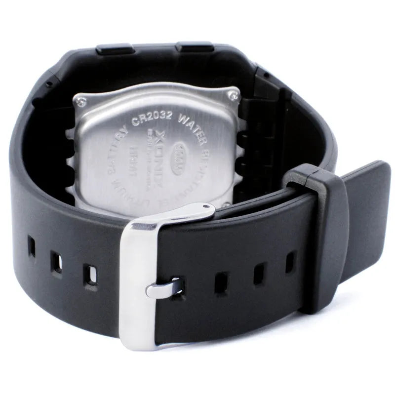 Men's waterproof digital sports watch with square dial, luminous display, heart rate monitor, black resin strap, and rubber case on wrist