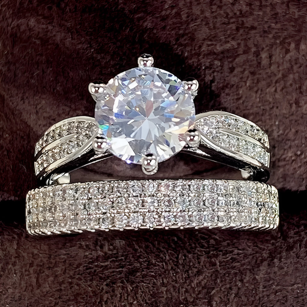 White gold colour alloy wedding bracelet with combined ring design and round geometry elements