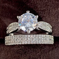 White gold colour alloy wedding bracelet with combined ring design and round geometry elements