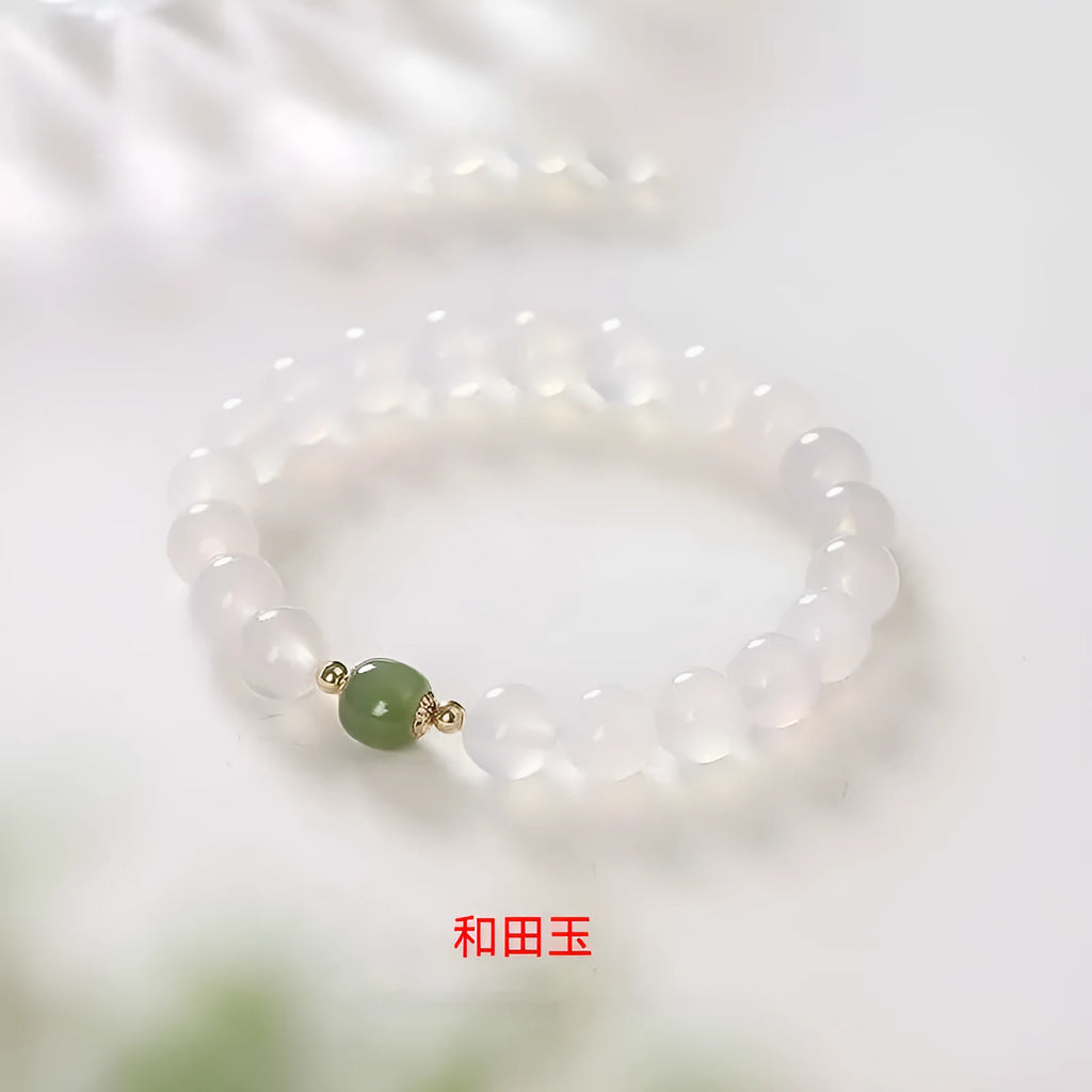 Natural white agate crystal bracelet with cinnabar inlay and text detail, handmade, 6mm and 8mm beads