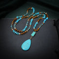 Turquoise blue heart pendant necklace with mixed gem inlay on ball bead chain