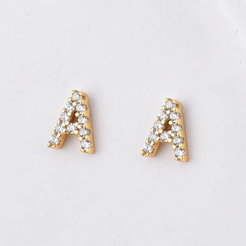 Gold plated alphabet letter earring showing a single charm on a stud or hook finding.