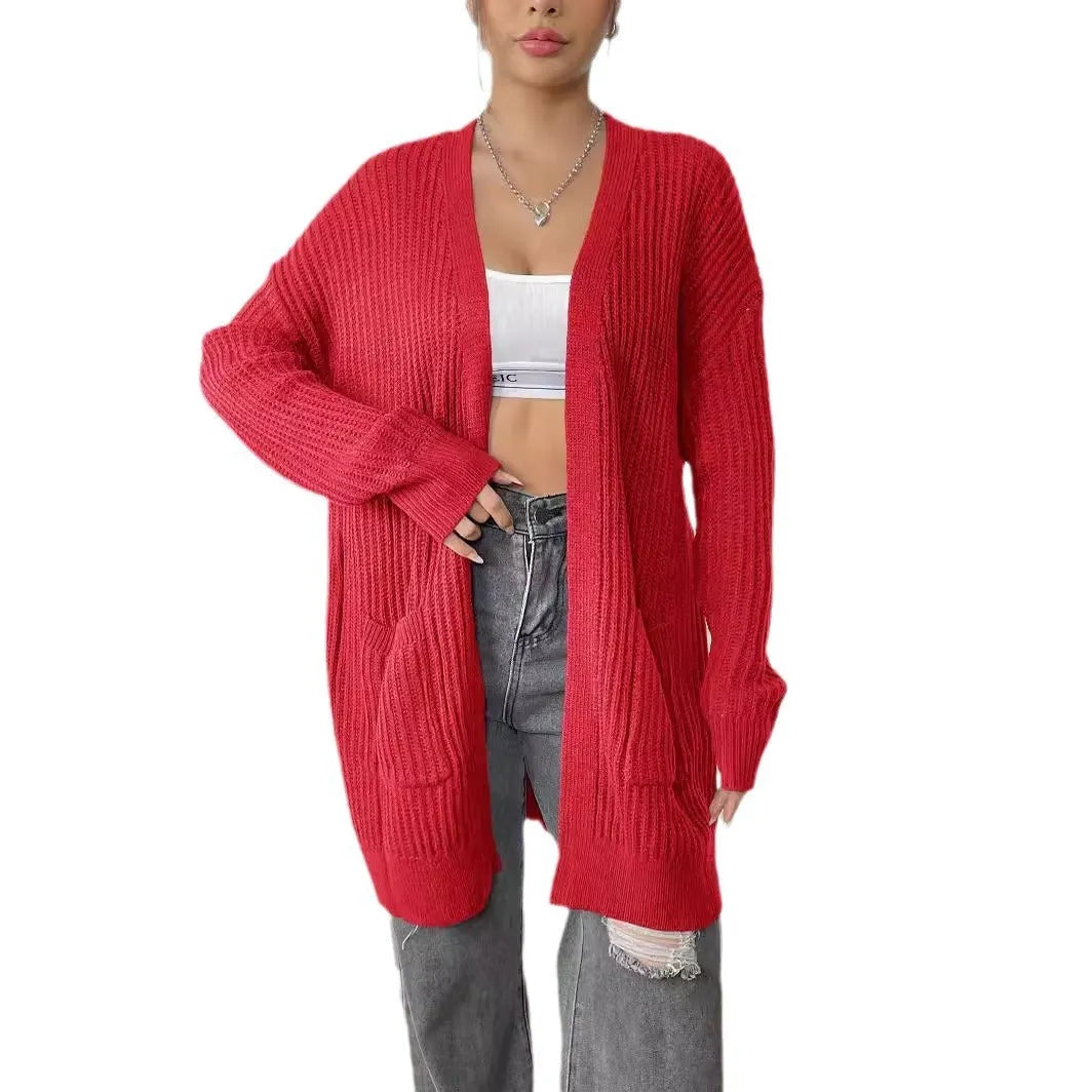 Women's loose-fit double pocket cardigan sweater in a solid colour