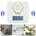 White wireless carbon monoxide alarm with wall mount bracket for home safety