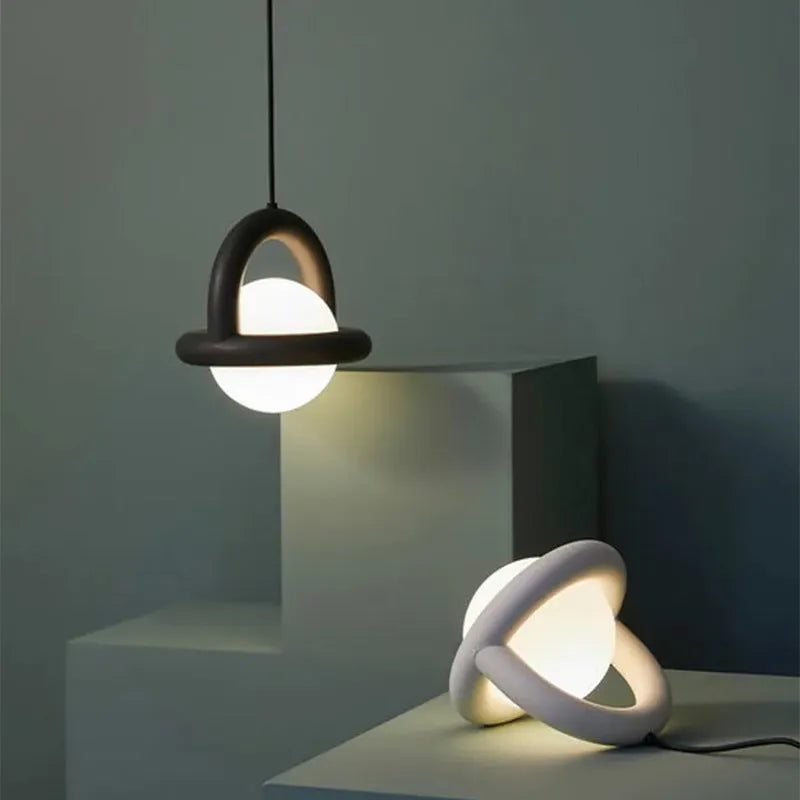 Modern Danish-style hanging pendant lamp in a matte finish with a linen shade.