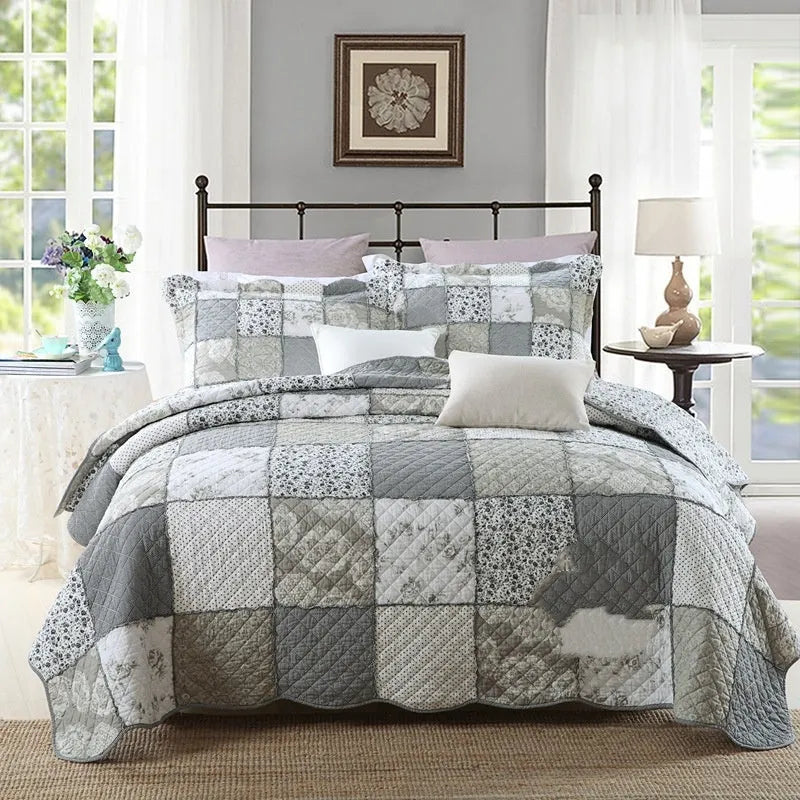 Pure cotton quilted bedspread three-piece set in a patterned colour with two matching pillowcases.