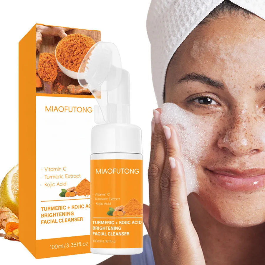 Facial care kit with turmeric cleansing mousse 490g, facial cleaning pads, and ginger granule soap on white background
