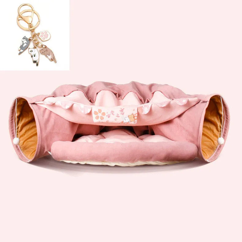 Collapsible cloth cat tunnel toy shown in one of four colours: bar, coffee, matcha, or pink