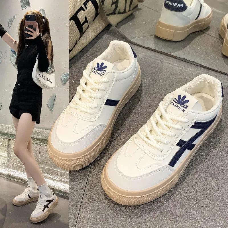 Classic low top sports casual board shoe with rubber sole and patent finish, brown colour, side view