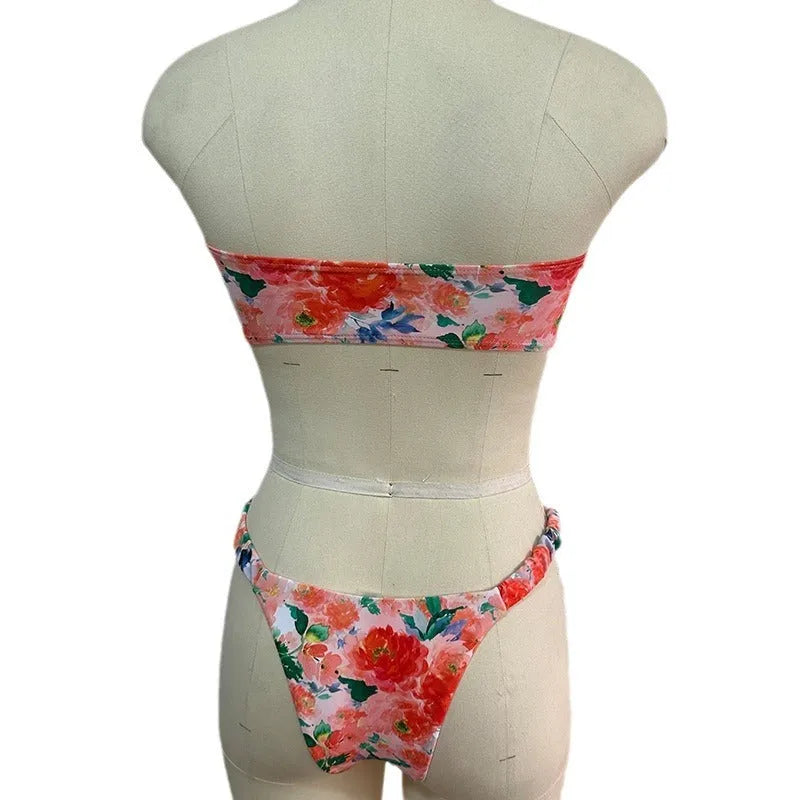 Floral print lace trim bikini top in blue, with matching short, shown on a mannequin.
