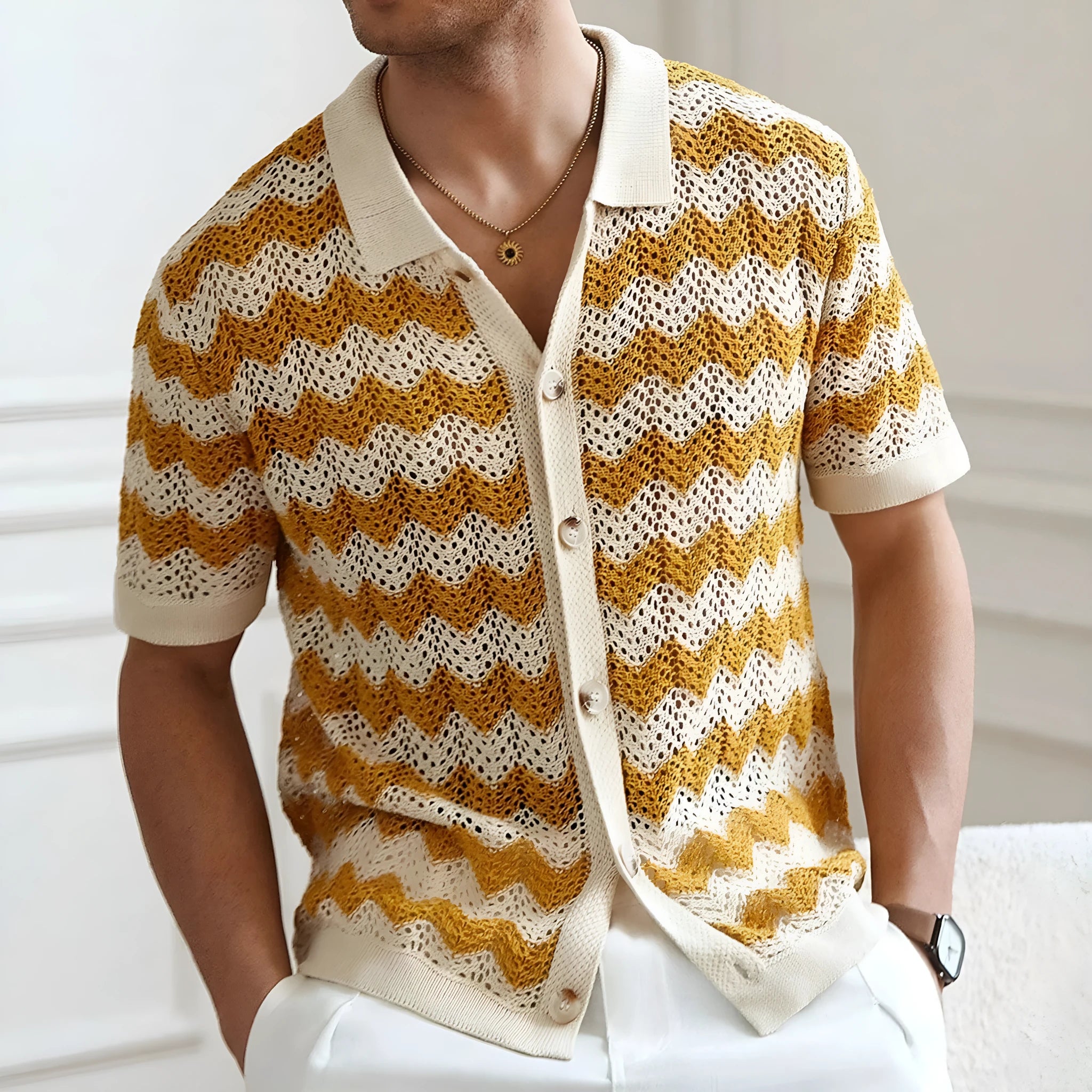 Yellow, blue, and brown short-sleeve sweater with hollow jacquard corrugated texture and flocking detail.