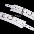 White PU sponge bondage set with handcuffs, foot cuffs and neck cuff for BDSM play