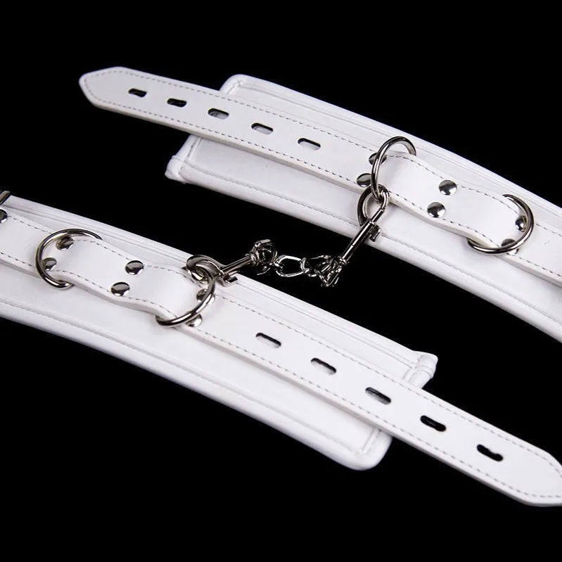 White PU sponge bondage set with handcuffs, foot cuffs and neck cuff for BDSM play