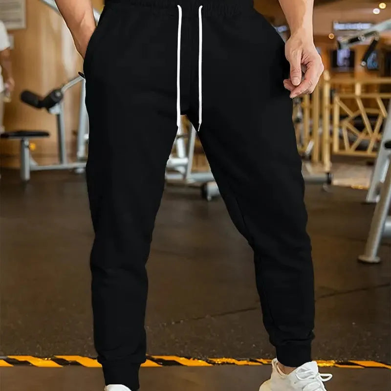 Men's linen leisure trousers in loose fit with elastic lace waist and drawstring, shown in colour option G52P064.