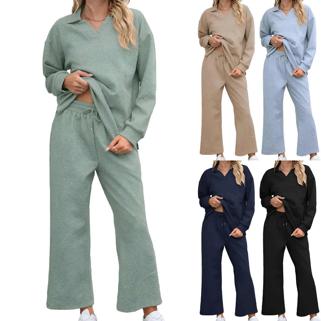 Women's solid colour knit suit with long sleeve V-neck sweater and elastic waist cropped trousers.