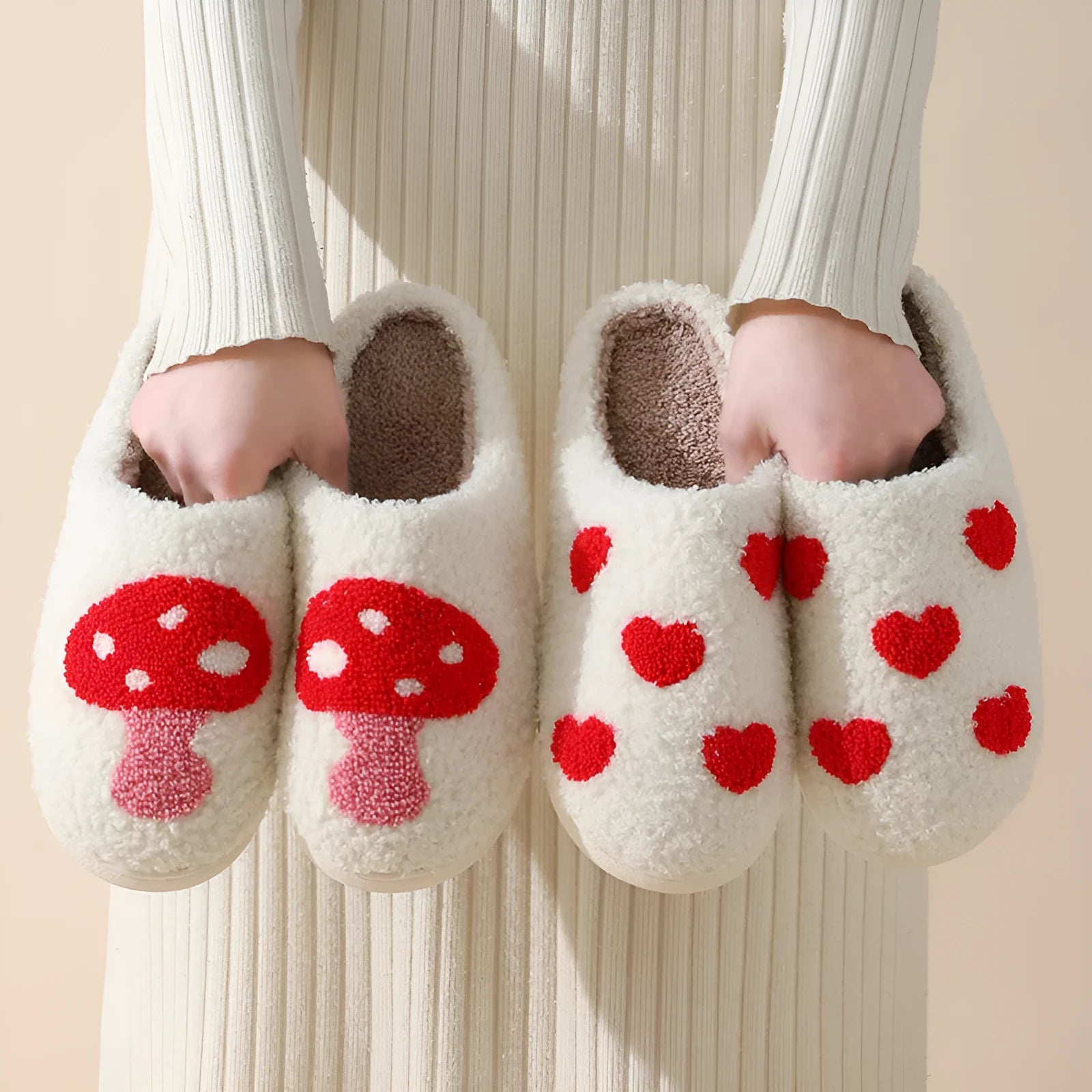 Women's plush cartoon love style home slippers with a round toe and non-slip PVC sole.