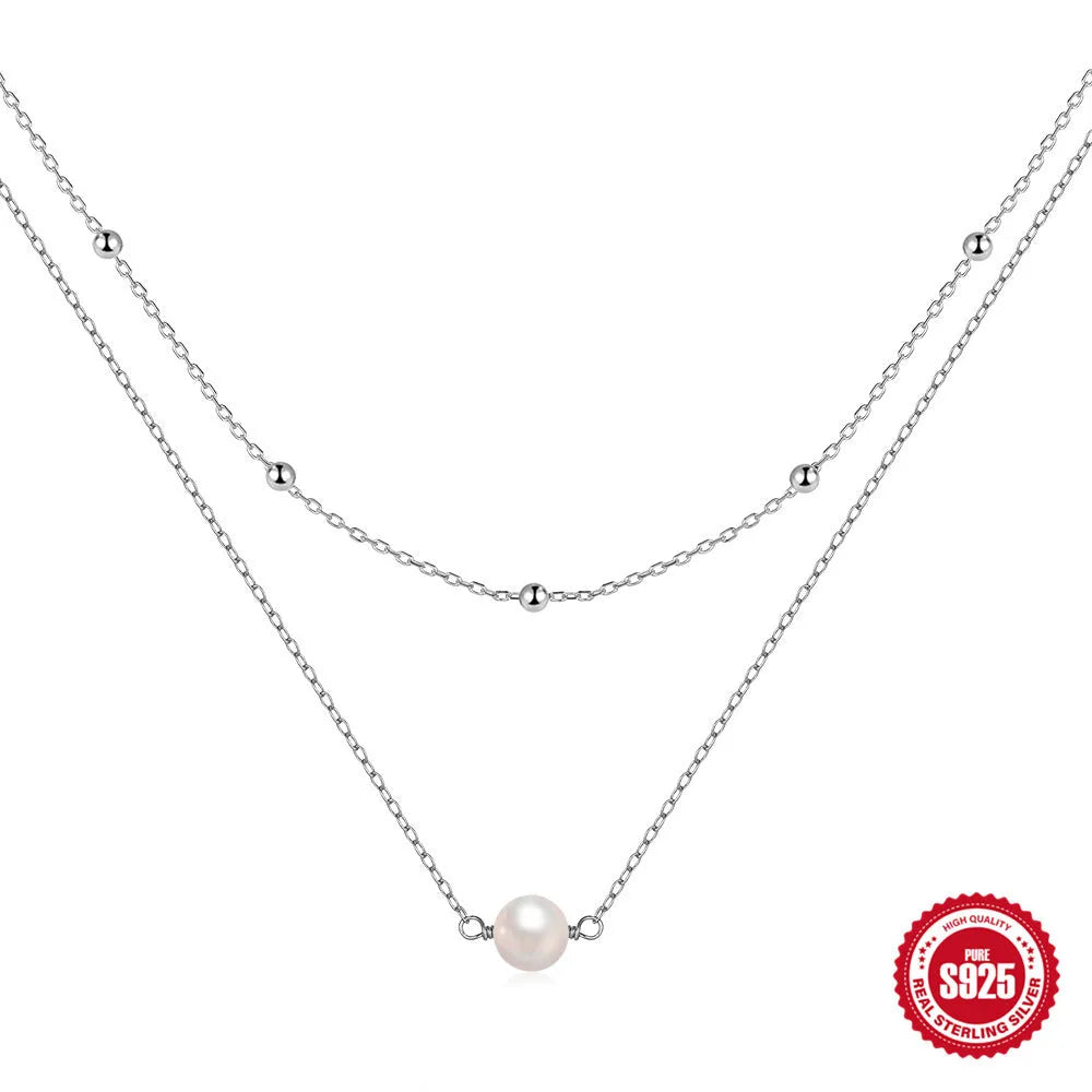Sterling silver double layer pearl necklace with geometric pendant on ball bead chain