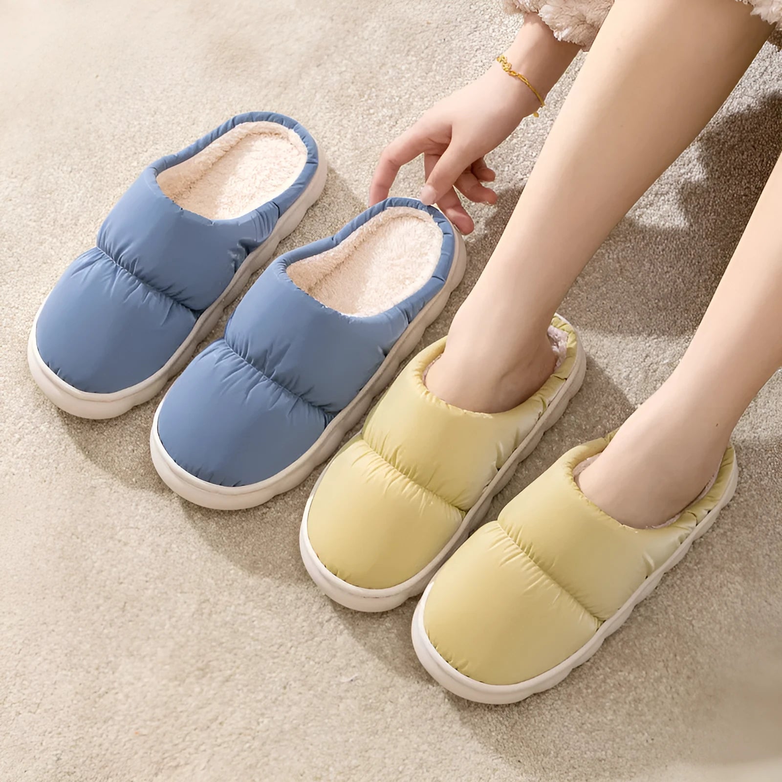 Pair of down cotton winter slippers with a thick rubber non-slip sole, shown in a choice of colours.