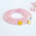 Pink artificial crystal multi-circle bracelet featuring classic Pi Xiu design on white background