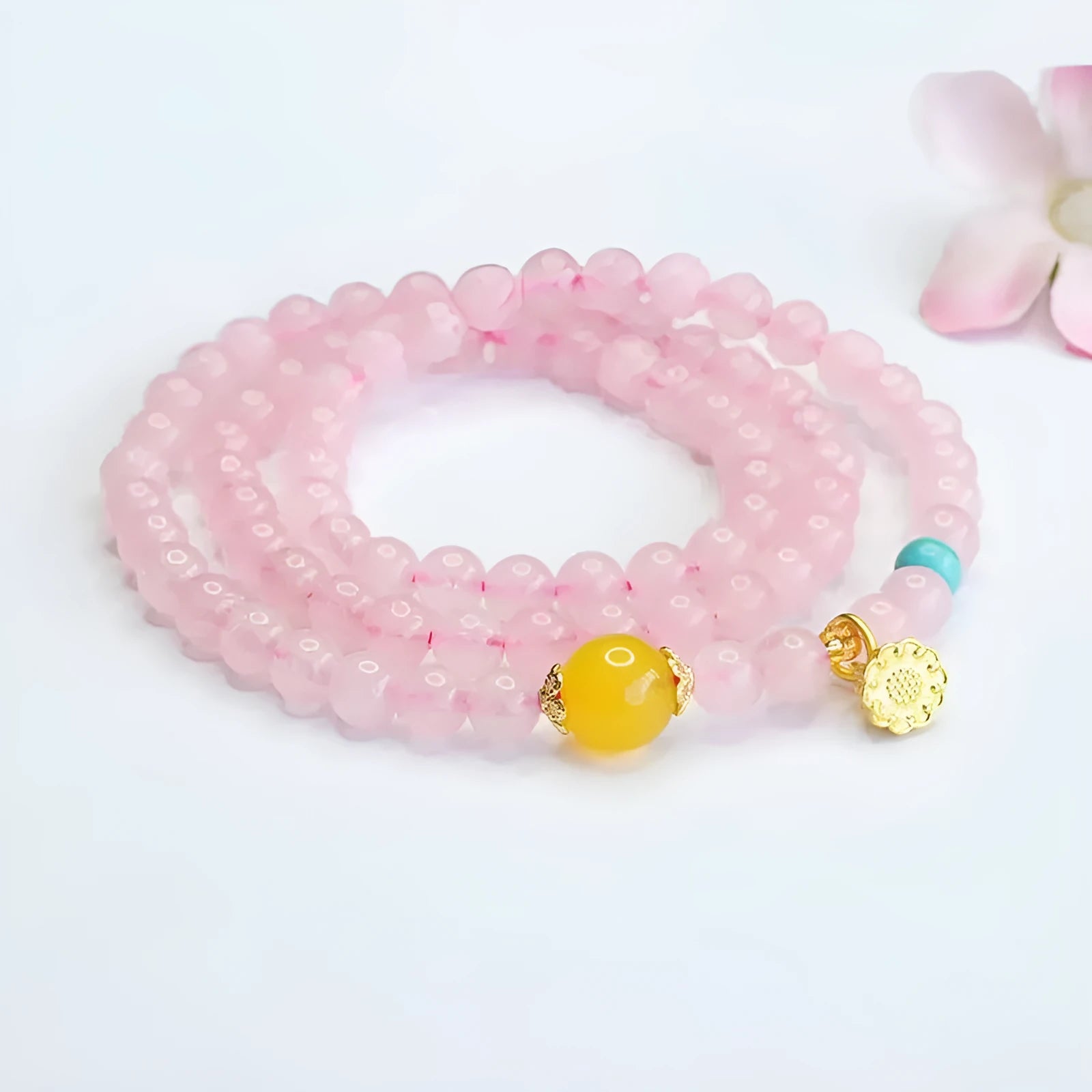 Pink artificial crystal multi-circle bracelet featuring classic Pi Xiu design on white background