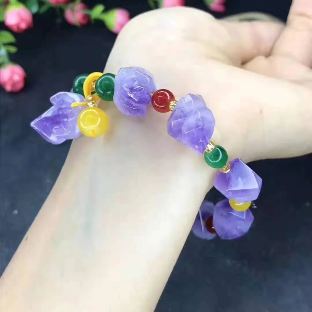 Natural shaped purple amethyst gemstone bracelet with a carved Fu character charm.