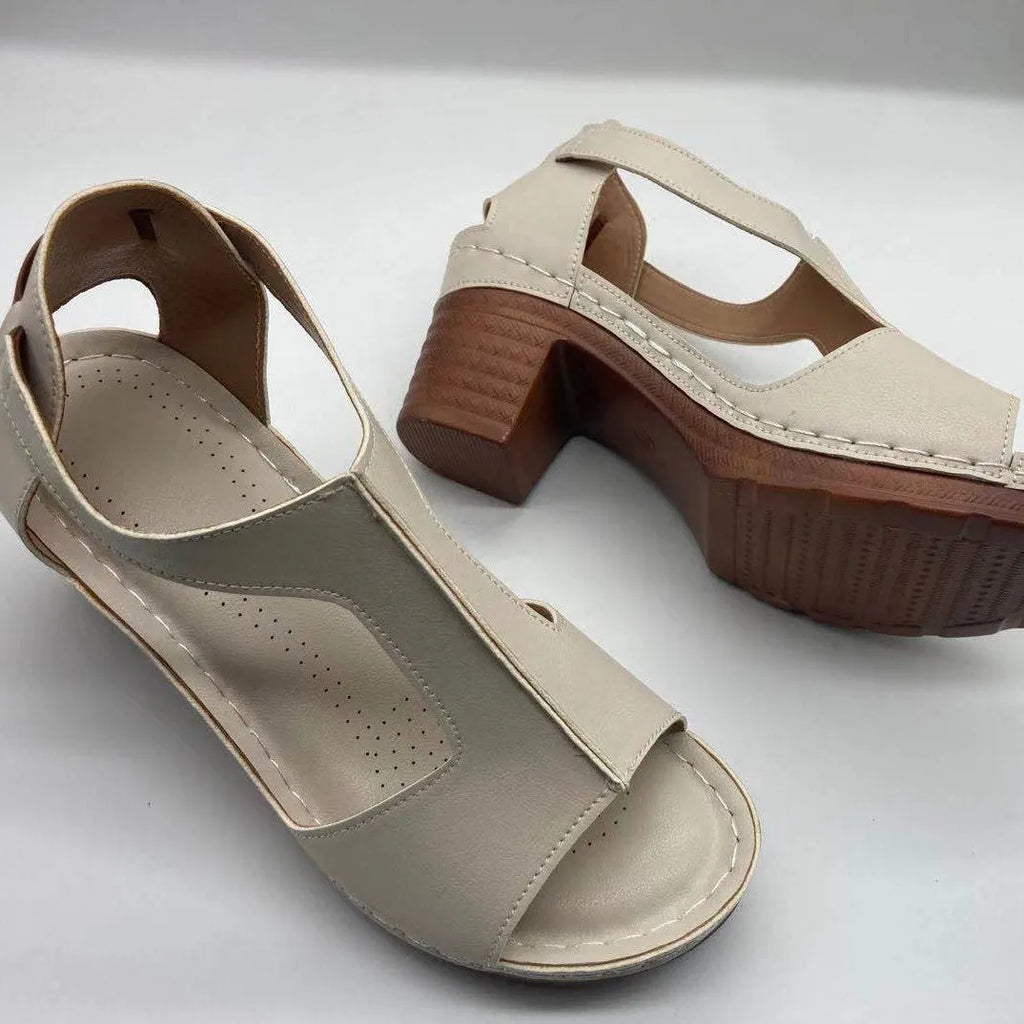 Womens plus size peep toe wedge sandals with buckle and low heel in various colours.