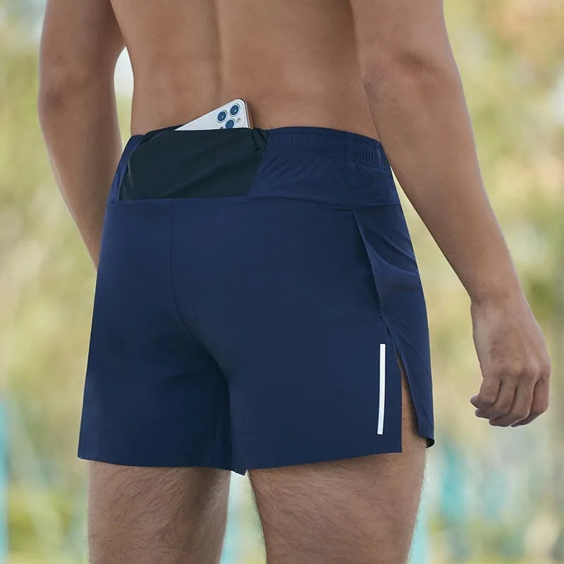 Men's loose fit off-road running shorts in black, shown from front and side.