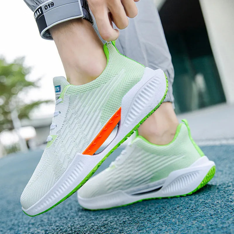 Men's blue breathable mesh casual shoe with round toe and injection moulded sole.