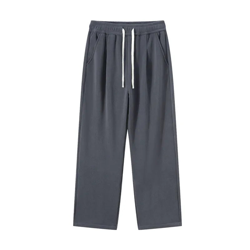 Men's apricot double-sided polar fleece loose-fit winter sports trousers with drawstring waist.