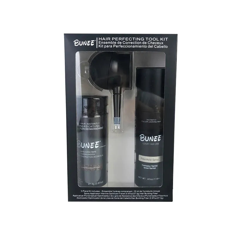 Hair fibre powder kit containing a 275g can, styling spray bottle, and applicator nozzle on a white background.