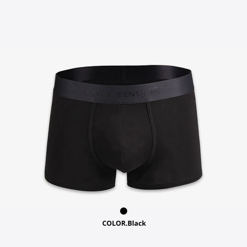 Men's solid colour cotton boxer shorts on a white background