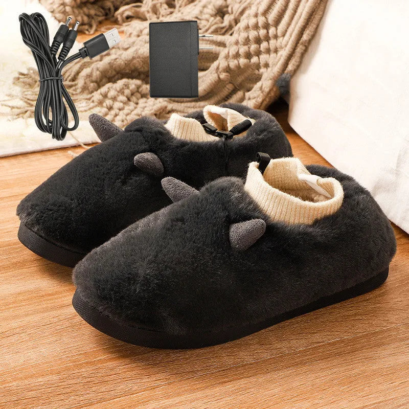 USB electric heating slippers in matcha green with a USB cable, showing the soft velvet upper.