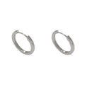 Geometric circle ear clips with gold plating and eyelet detail for women's pierced ears