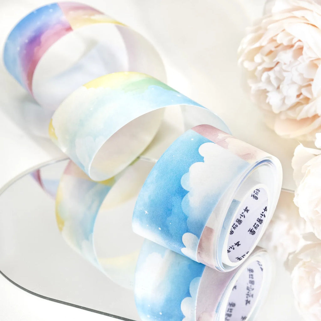 Japanese paper washi tape journal stickers showing six sky patterns including colourful clouds and twilight on 30mm wide 2m long roll