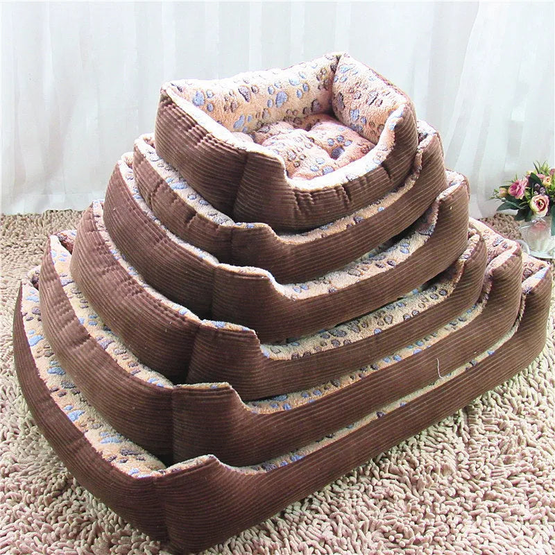 Plush sofa-style dog bed with raised sides in beige colour for small dogs